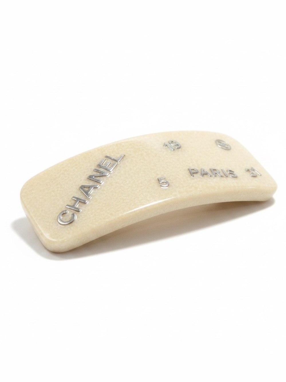 CHANEL Cream Resin Logo Curved Hair Barrette